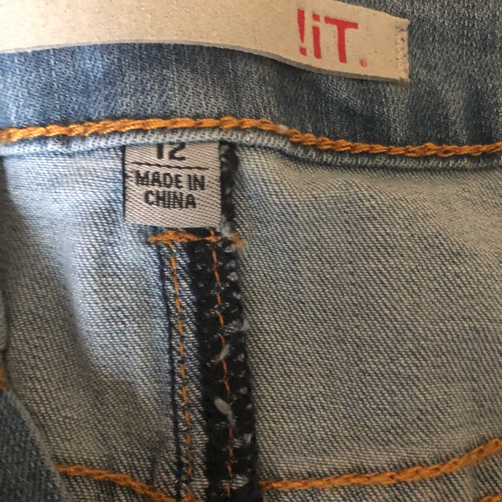 Blue jean skirt with fashionable rips